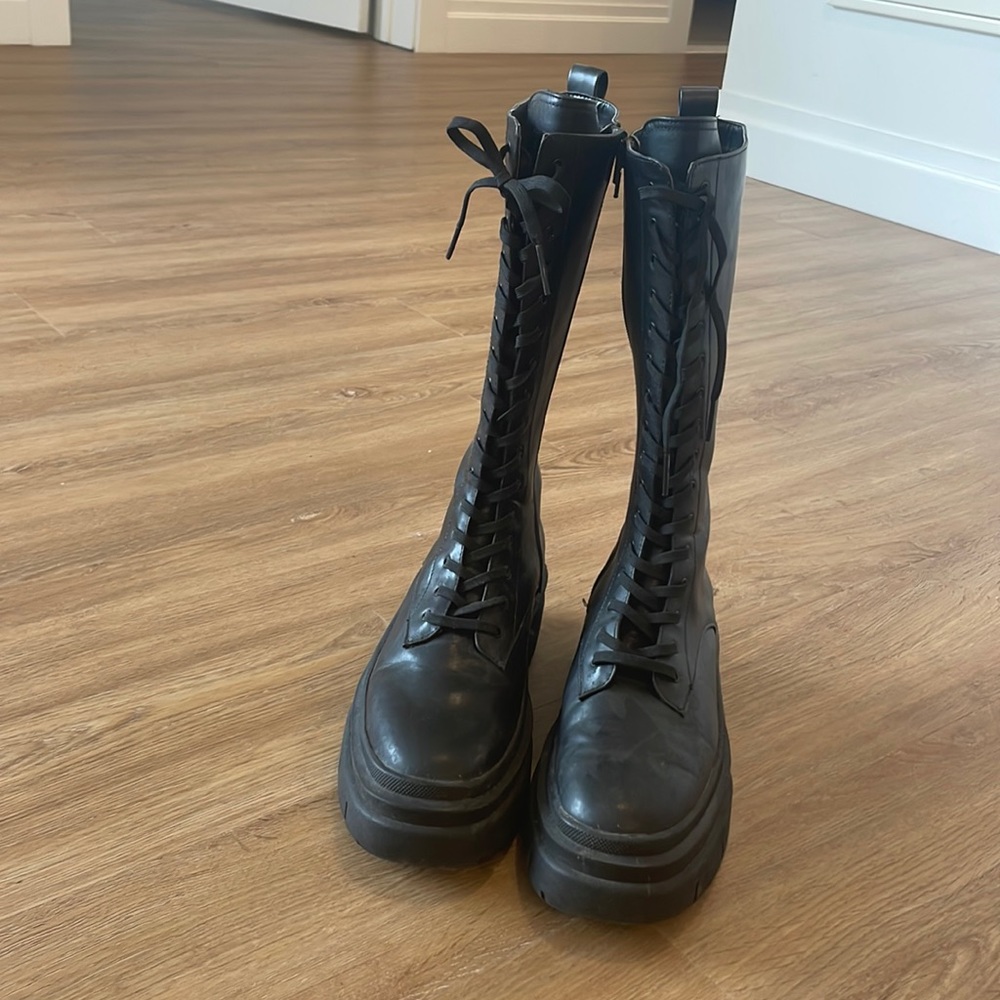 Gently worn to the knee combat boots